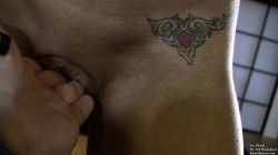 close up of Ivy Black’s pelvis tattoo