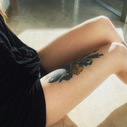Hattie Watson’s right leg tattoo on her thigh