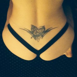 Alicia Secrets tramp stamp